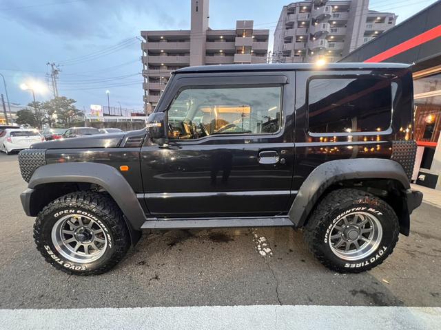 ジムニーシエラ ＪＣ　ワンオーナー　２インチリフトアップ　マッドテレインタイヤ　レイズ１５インチＡＷ　セーフティサポート　クルーズＣ　ダウンヒルアシスト　純正ナビフルセグＢカメラ　シートカバー（40枚目）