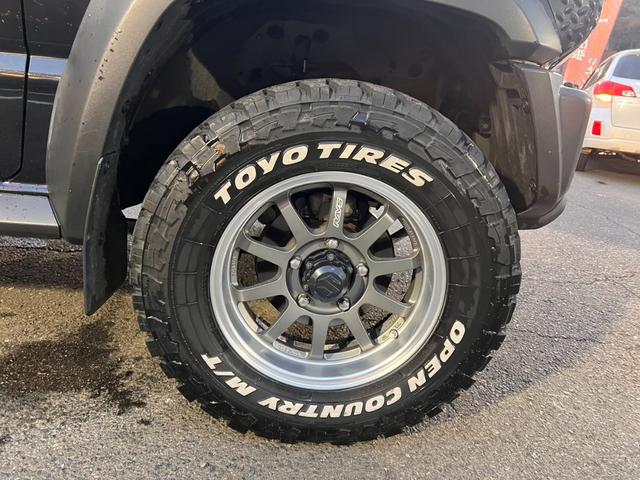 ジムニーシエラ ＪＣ　ワンオーナー　２インチリフトアップ　マッドテレインタイヤ　レイズ１５インチＡＷ　セーフティサポート　クルーズＣ　ダウンヒルアシスト　純正ナビフルセグＢカメラ　シートカバー（41枚目）