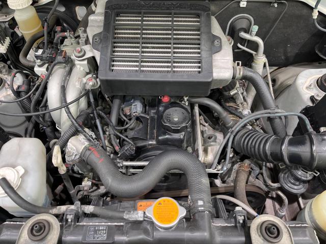 RX 4WD ターボ 禁煙車 HIDフロントフォグ 運転席シートヒーター ZACK製15インチアルミホイール トランスファーレバー ヘッドライトレベライザー 純正オーディオ 電動格納ミラー(19枚目)