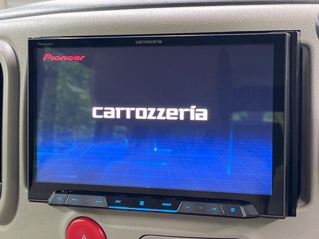 キューブ １５Ｘ　ＣＡＲＯＺＺＥＲＩＡ製ＳＤナビ　バックカメラ　禁煙車　スマートキー　オートエアコン　Ｂｌｕｅｔｏｏｔｈ再生　ＣＤ／ＤＶＤ再生　フルセグ　革巻きハンドル　ドアバイザー　盗難防止装置　プライバシーガラス（3枚目）