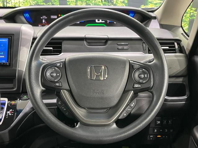 フリード＋ハイブリッド ハイブリッドＧ・ホンダセンシング　４ＷＤ　両側電動ドア　ＳＤナビ　バックカメラ　寒冷地仕様　ホンダセンシング　レーダークルーズ　禁煙車　スマートキー　ＬＥＤヘッド　シートヒーター　ＥＴＣ　車線逸脱警報　オートライト　オートエアコン（12枚目）