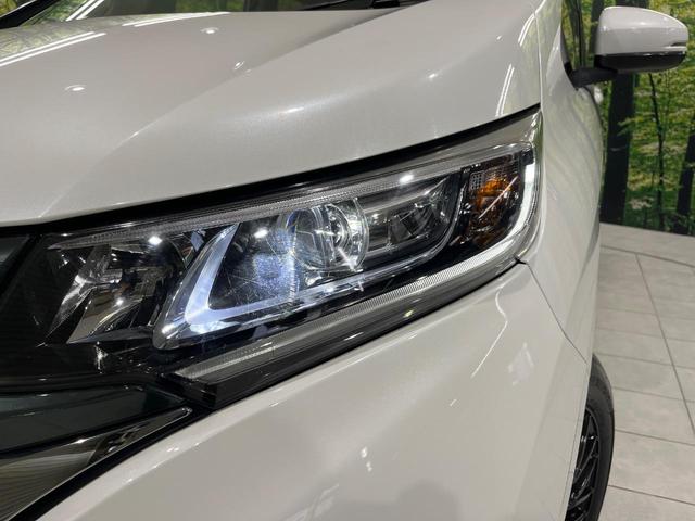 フリード＋ハイブリッド ハイブリッドＧ・ホンダセンシング　４ＷＤ　両側電動ドア　ＳＤナビ　バックカメラ　寒冷地仕様　ホンダセンシング　レーダークルーズ　禁煙車　スマートキー　ＬＥＤヘッド　シートヒーター　ＥＴＣ　車線逸脱警報　オートライト　オートエアコン（14枚目）