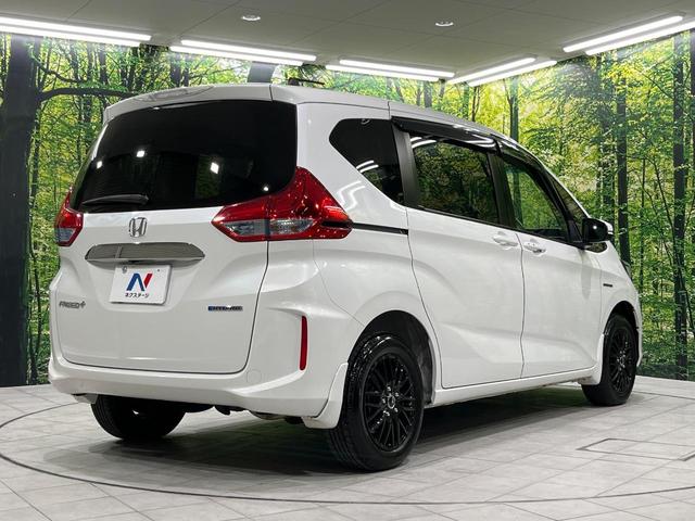 フリード＋ハイブリッド ハイブリッドＧ・ホンダセンシング　４ＷＤ　両側電動ドア　ＳＤナビ　バックカメラ　寒冷地仕様　ホンダセンシング　レーダークルーズ　禁煙車　スマートキー　ＬＥＤヘッド　シートヒーター　ＥＴＣ　車線逸脱警報　オートライト　オートエアコン（18枚目）