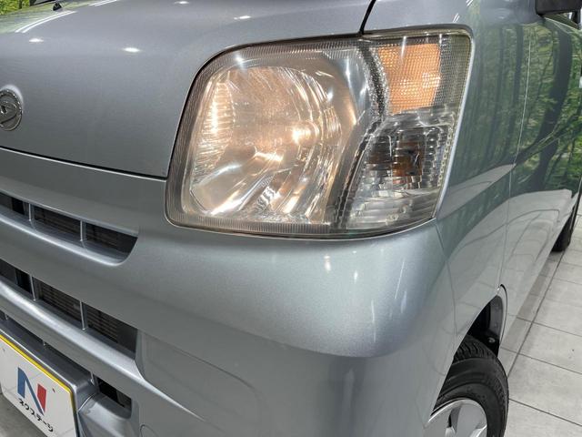 ハイゼットカーゴ クルーズ 4WD 5MT車 禁煙車 CD再生 エアコン 電動格納ミラー プライバシーガラス 盗難防止装置 ドアバイザー 両側スライドドア パワーステアリング ABS 衝突安全ボディ(11枚目)