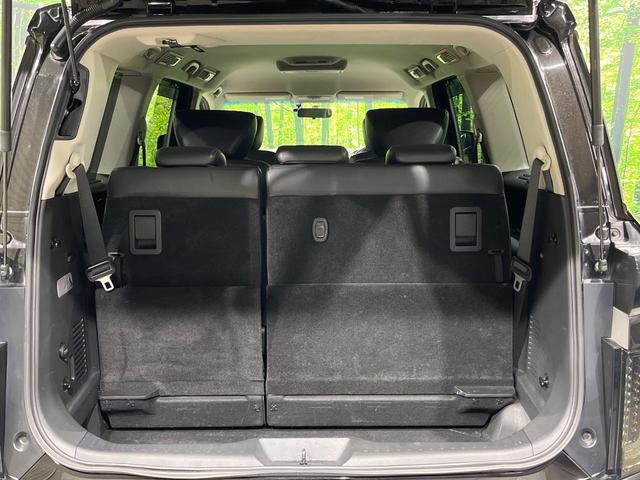 エルグランド 250ハイウェイスタープレミアム 4WD 両側電動ドア 純正SDナビ バックカメラ 電動リアゲート レザーシート ドラレコ スマートキー HIDヘッド ビルトインETC クルコン オートライト デュアルエアコン 助手席電動オットマン(12枚目)