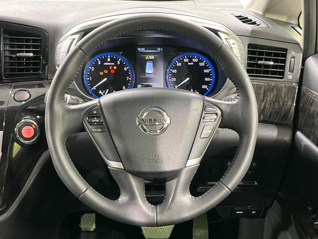 エルグランド 250ハイウェイスタープレミアム 4WD 両側電動ドア 純正SDナビ バックカメラ 電動リアゲート レザーシート ドラレコ スマートキー HIDヘッド ビルトインETC クルコン オートライト デュアルエアコン 助手席電動オットマン(13枚目)