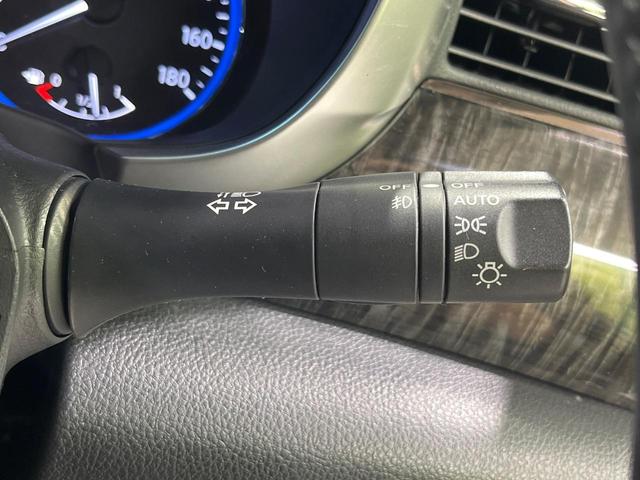 エルグランド 250ハイウェイスタープレミアム 4WD 両側電動ドア 純正SDナビ バックカメラ 電動リアゲート レザーシート ドラレコ スマートキー HIDヘッド ビルトインETC クルコン オートライト デュアルエアコン 助手席電動オットマン(34枚目)