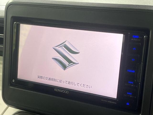 スペーシア ハイブリッドG 純正SDナビ バックカメラ 禁煙車 衝突軽減装置 オートライト オートエアコン クリアランスソナー スマートキー シートヒーター ドアバイザー プライバシーガラス CD/DVD再生 盗難防止システム(3枚目)