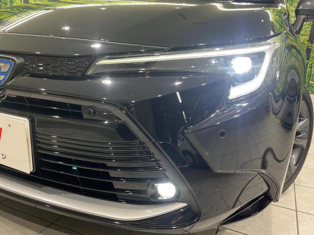 カローラツーリング ハイブリッド ダブルバイビー 4WD 純正8型ナビ バックカメラ 禁煙車 寒冷地仕様 セーフティセンス レーダークルーズ ビルトインETC 前席シートヒーター LEDヘッド&フォグ オートライト ステアリングヒーター(13枚目)