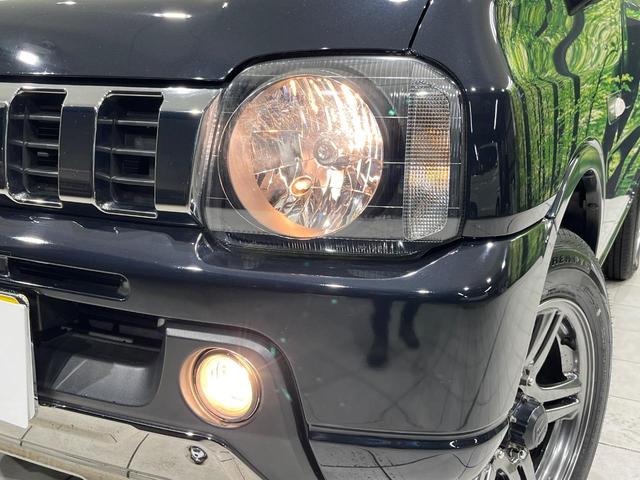 ジムニー ランドベンチャー　ＳＤナビ　禁煙車　シートヒーター　電動格納ミラー　革巻きステアリング　プライバシーガラス　ドアバイザー　電動格納ミラー　パワーステアリング　パワーウィンドウ　フルセグ　盗難防止システム　衝突安全ボディ（12枚目）