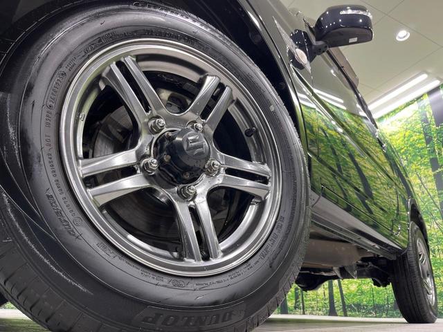 ジムニー ランドベンチャー　ＳＤナビ　禁煙車　シートヒーター　電動格納ミラー　革巻きステアリング　プライバシーガラス　ドアバイザー　電動格納ミラー　パワーステアリング　パワーウィンドウ　フルセグ　盗難防止システム　衝突安全ボディ（13枚目）