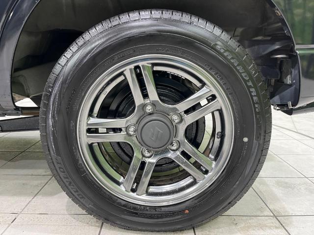 ジムニー ランドベンチャー　ＳＤナビ　禁煙車　シートヒーター　電動格納ミラー　革巻きステアリング　プライバシーガラス　ドアバイザー　電動格納ミラー　パワーステアリング　パワーウィンドウ　フルセグ　盗難防止システム　衝突安全ボディ（54枚目）