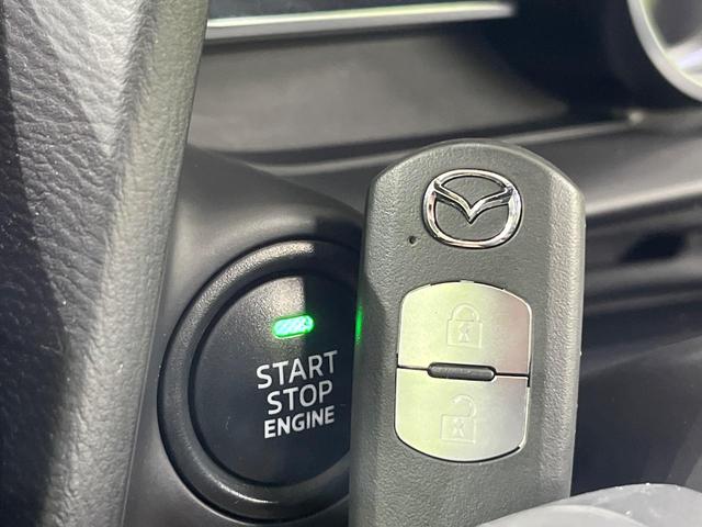 デミオ １５Ｓツーリング　Ｌパッケージ　４ＷＤ　マツダコネクト　全周囲カメラ　衝突軽減安全システム　ハーフレザーシート　スマートキー　ＬＥＤヘッド　ＥＴＣ　クルコン　純正１６インチアルミ　オートライト　オートエアコン　Ｂｌｕｅｔｏｏｔｈ（8枚目）