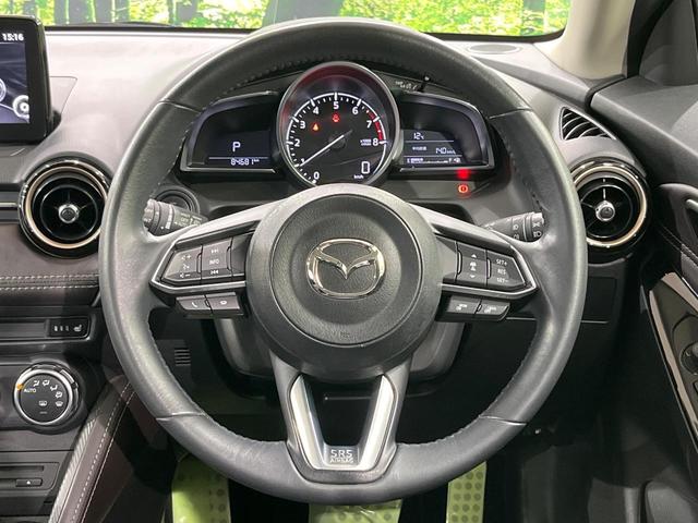 デミオ １５Ｓツーリング　Ｌパッケージ　４ＷＤ　マツダコネクト　全周囲カメラ　衝突軽減安全システム　ハーフレザーシート　スマートキー　ＬＥＤヘッド　ＥＴＣ　クルコン　純正１６インチアルミ　オートライト　オートエアコン　Ｂｌｕｅｔｏｏｔｈ（12枚目）