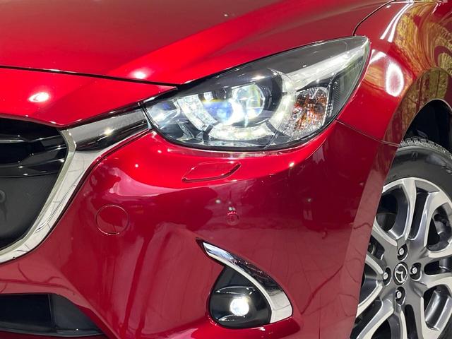 デミオ １５Ｓツーリング　Ｌパッケージ　４ＷＤ　マツダコネクト　全周囲カメラ　衝突軽減安全システム　ハーフレザーシート　スマートキー　ＬＥＤヘッド　ＥＴＣ　クルコン　純正１６インチアルミ　オートライト　オートエアコン　Ｂｌｕｅｔｏｏｔｈ（13枚目）