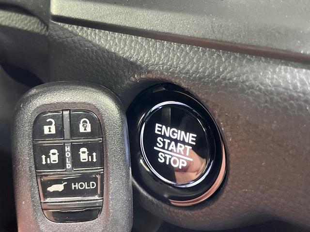 ステップワゴン スパーダ　４ＷＤ　両側電動ドア　バックカメラ　寒冷地仕様　ホンダセンシング　レーダークルーズ　禁煙車　電動リアゲート　ハーフレザーシート　ドラレコ　コーナーセンサー　スマートキー　ＬＥＤヘッド　ＥＴＣ（8枚目）