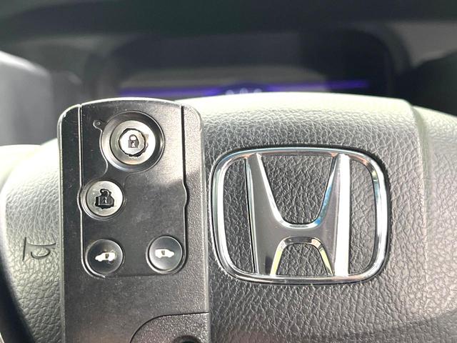 ステップワゴンスパーダ Z クールスピリット 両側電動スライドドア パナソニック製8型SDナビ バックカメラ 寒冷地仕様 禁煙車 ハーフレザーシート スマートキー HIDヘッド ETC クルコン オートライト オートエアコン 盗難防止装置(7枚目)