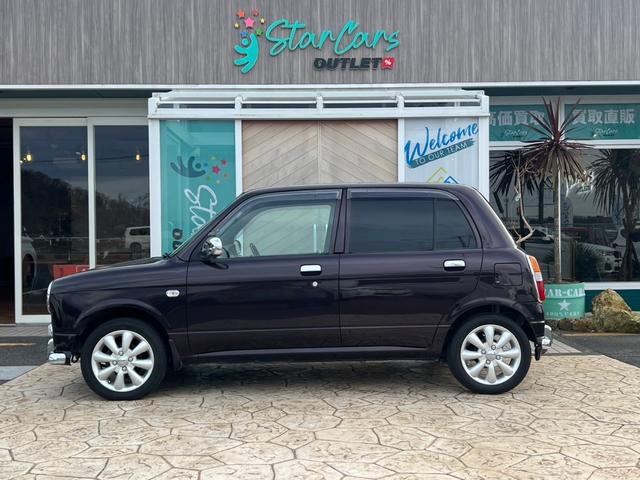 ミラジーノ ジーノ　社外ステアリング　パワステ　キーレス付き　衝突安全ボディ　マニュアルエアコン　全席パワーウインドウ　ＳＲＳ　カロッツェリアナビ（6枚目）