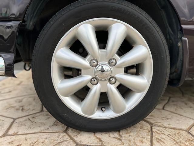 ミラジーノ ジーノ　社外ステアリング　パワステ　キーレス付き　衝突安全ボディ　マニュアルエアコン　全席パワーウインドウ　ＳＲＳ　カロッツェリアナビ（7枚目）