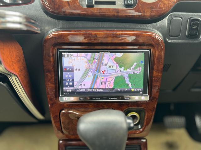 ミラジーノ ジーノ　社外ステアリング　パワステ　キーレス付き　衝突安全ボディ　マニュアルエアコン　全席パワーウインドウ　ＳＲＳ　カロッツェリアナビ（13枚目）