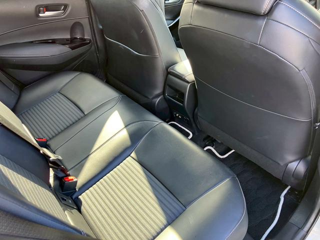 カローラツーリング ハイブリッド ダブルバイビー DPオーディオ ステアリングヒーター 置くだけ充電 ハーフレザー フォグランプ ACC レーンキープ ETC2.0 フルセグTV Bluetooth AC100V バックカメラ 衝突軽減ブレーキ(24枚目)