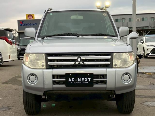 パジェロミニ ナビエディションXR オーディオ/純正アルミホイール/電動格納ミラー/トランクスポイラー/ルーフレール/パワーウィンドウ/ハロゲンライト/エアバッグ/キーレス/マニュアルエアコン(4枚目)