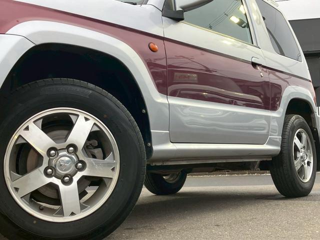 パジェロミニ ナビエディションXR オーディオ/純正アルミホイール/電動格納ミラー/トランクスポイラー/ルーフレール/パワーウィンドウ/ハロゲンライト/エアバッグ/キーレス/マニュアルエアコン(7枚目)