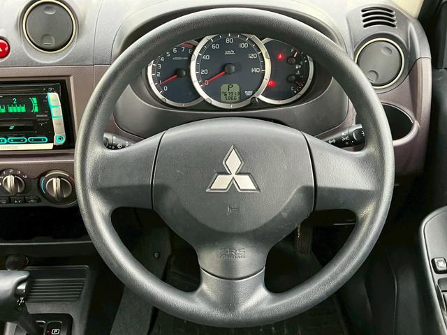 パジェロミニ ナビエディションXR オーディオ/純正アルミホイール/電動格納ミラー/トランクスポイラー/ルーフレール/パワーウィンドウ/ハロゲンライト/エアバッグ/キーレス/マニュアルエアコン(9枚目)