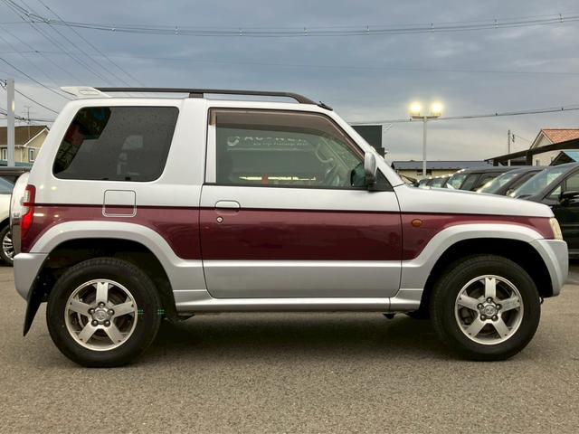 パジェロミニ ナビエディションXR オーディオ/純正アルミホイール/電動格納ミラー/トランクスポイラー/ルーフレール/パワーウィンドウ/ハロゲンライト/エアバッグ/キーレス/マニュアルエアコン(16枚目)