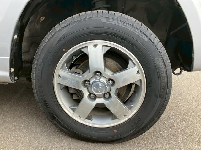 パジェロミニ ナビエディションXR オーディオ/純正アルミホイール/電動格納ミラー/トランクスポイラー/ルーフレール/パワーウィンドウ/ハロゲンライト/エアバッグ/キーレス/マニュアルエアコン(25枚目)