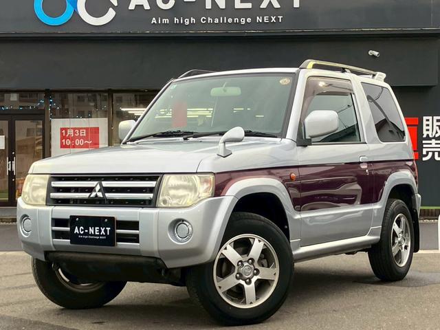 パジェロミニ ナビエディションXR オーディオ/純正アルミホイール/電動格納ミラー/トランクスポイラー/ルーフレール/パワーウィンドウ/ハロゲンライト/エアバッグ/キーレス/マニュアルエアコン(30枚目)