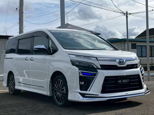 ヴォクシー ハイブリッドＺＳ　煌ＩＩＩ　純正ディスプレイナビ　バックカメラ　フルセグ　モデリスタフルエアロ　クルコン　Ｗエアコン　シートヒーター　ＥＴＣ　電動格納ミラー　オートライト　ステリモ　衝突軽減　レーンキープ　横滑り防止　エアバッグ（20枚目）