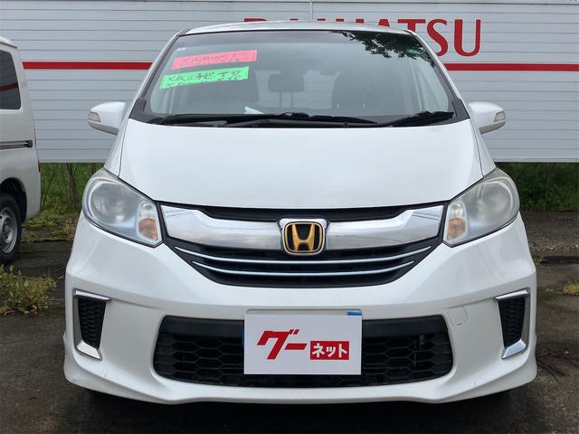 フリードハイブリッド ジャストセレクション　ＥＴＣ　バックカメラ　ナビ　ＴＶ　オートクルーズコントロール　両側電動スライドドア　ＨＩＤ　スマートキー　電動格納ミラー　３列シート　ウォークスルー　ＣＶＴ　アルミホイール　盗難防止システム（12枚目）