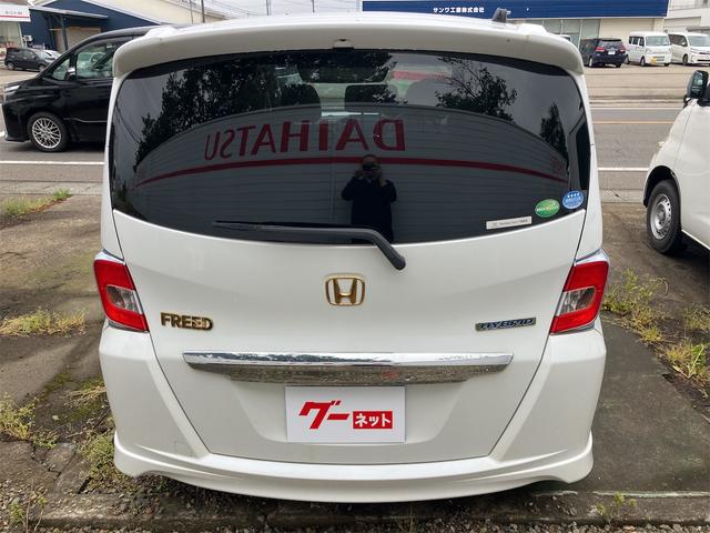 フリードハイブリッド ジャストセレクション　ＥＴＣ　バックカメラ　ナビ　ＴＶ　オートクルーズコントロール　両側電動スライドドア　ＨＩＤ　スマートキー　電動格納ミラー　３列シート　ウォークスルー　ＣＶＴ　アルミホイール　盗難防止システム（16枚目）