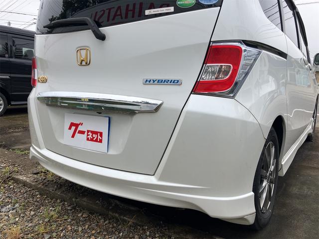 フリードハイブリッド ジャストセレクション　ＥＴＣ　バックカメラ　ナビ　ＴＶ　オートクルーズコントロール　両側電動スライドドア　ＨＩＤ　スマートキー　電動格納ミラー　３列シート　ウォークスルー　ＣＶＴ　アルミホイール　盗難防止システム（23枚目）