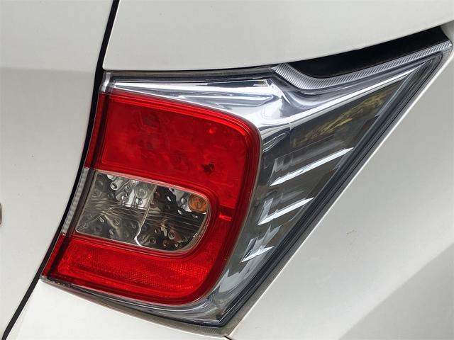 フリードハイブリッド ジャストセレクション　ＥＴＣ　バックカメラ　ナビ　ＴＶ　オートクルーズコントロール　両側電動スライドドア　ＨＩＤ　スマートキー　電動格納ミラー　３列シート　ウォークスルー　ＣＶＴ　アルミホイール　盗難防止システム（34枚目）