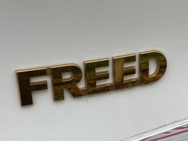 フリードハイブリッド ジャストセレクション　ＥＴＣ　バックカメラ　ナビ　ＴＶ　オートクルーズコントロール　両側電動スライドドア　ＨＩＤ　スマートキー　電動格納ミラー　３列シート　ウォークスルー　ＣＶＴ　アルミホイール　盗難防止システム（36枚目）