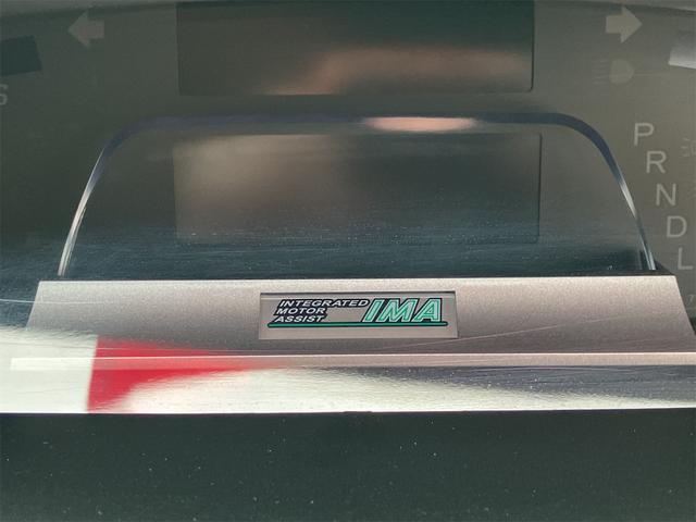 フリードハイブリッド ジャストセレクション　ＥＴＣ　バックカメラ　ナビ　ＴＶ　オートクルーズコントロール　両側電動スライドドア　ＨＩＤ　スマートキー　電動格納ミラー　３列シート　ウォークスルー　ＣＶＴ　アルミホイール　盗難防止システム（52枚目）