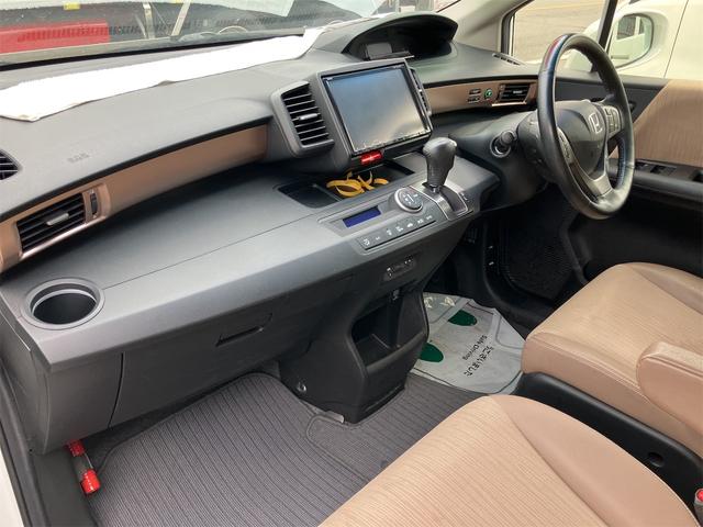 フリードハイブリッド ジャストセレクション　ＥＴＣ　バックカメラ　ナビ　ＴＶ　オートクルーズコントロール　両側電動スライドドア　ＨＩＤ　スマートキー　電動格納ミラー　３列シート　ウォークスルー　ＣＶＴ　アルミホイール　盗難防止システム（67枚目）