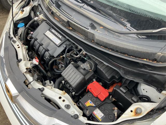フリードハイブリッド ジャストセレクション　ＥＴＣ　バックカメラ　ナビ　ＴＶ　オートクルーズコントロール　両側電動スライドドア　ＨＩＤ　スマートキー　電動格納ミラー　３列シート　ウォークスルー　ＣＶＴ　アルミホイール　盗難防止システム（75枚目）