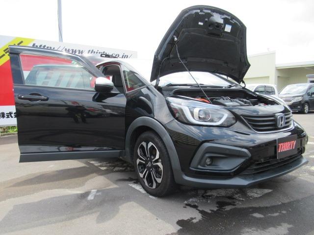 フィット ｅ：ＨＥＶクロスター　４ＷＤ／禁煙車／寒冷地仕様／衝突軽減ブレーキ／クリアランスソナー／レーダークルコン／純正ナビ／フルセグ／前後ドライブレコーダー／純正アルミホイール／ドアバイザー／バックカメラ／ＥＴＣ／ワイパーデアイサ（67枚目）