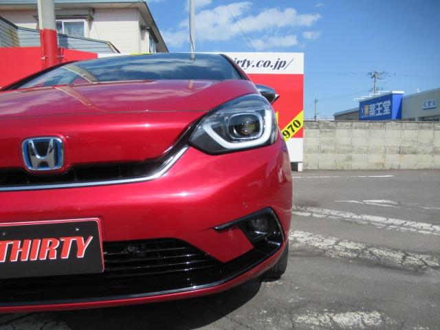 フィット ｅ：ＨＥＶリュクス　茶革シート／禁煙車／関東仕入れ／衝突軽減ブレーキ／寒冷地仕様／レーダークルコン／クリアランスソナー／純正ナビ／フルセグ／ワイパーデアイサー／ドアバイザー／シートヒーター／バックカメラ／ドラレコ／ＥＴＣ（73枚目）