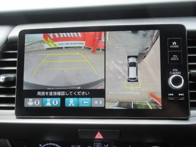 フィット ｅ：ＨＥＶリュクス　４ＷＤ／禁煙車／衝突軽減ブレーキ／全周囲カメラ／純正９型ナビ／フルセグＴＶ／ＥＴＣ２．０／クリアランスソナー／ステアリングヒーター／レーダークルコン／ワイパーデアイサー／ブラインドスポットモニター（25枚目）