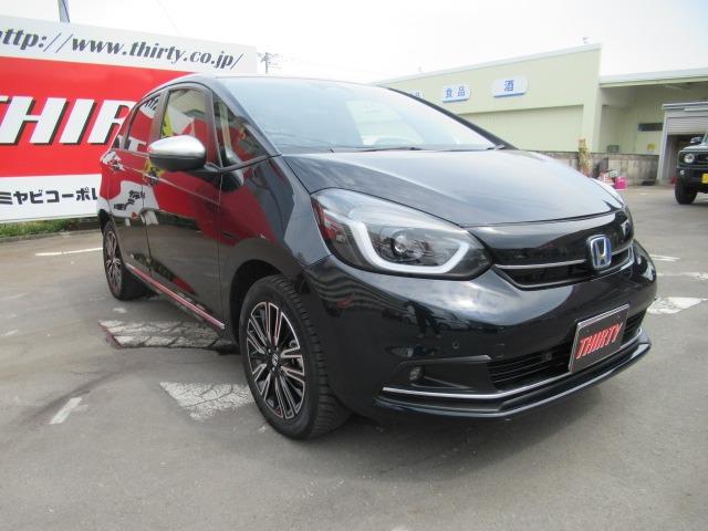 フィット ｅ：ＨＥＶリュクス　４ＷＤ／禁煙車／衝突軽減ブレーキ／全周囲カメラ／純正９型ナビ／フルセグＴＶ／ＥＴＣ２．０／クリアランスソナー／ステアリングヒーター／レーダークルコン／ワイパーデアイサー／ブラインドスポットモニター（37枚目）