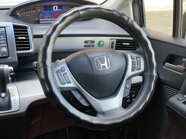 フリードハイブリッド ジャストセレクション　両側電動パワスラ　純正ナビ　ＴＶ　Ｂカメラ　後部座席モニター　ＥＴＣ　クルコン（33枚目）