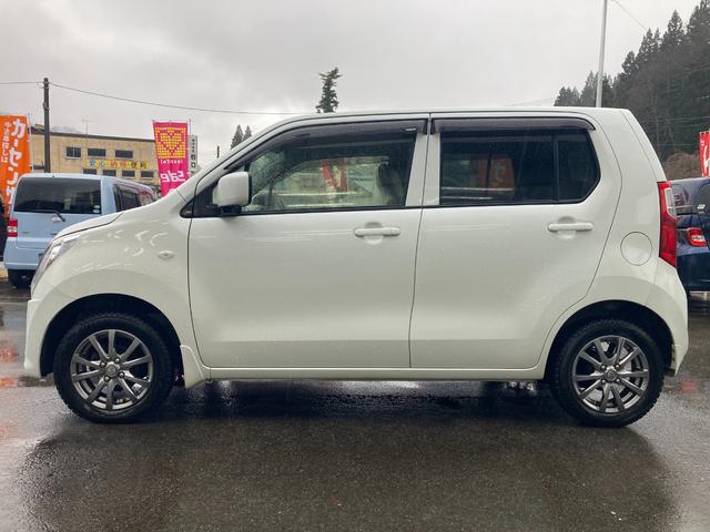 ワゴンＲ ＦＸ　禁煙車両・寒冷地仕様ヒーテッドドアミラー　ＣＤ／ＡＭ／ＦＭデッキ　オートエアコン　プライバシーガラス　アイドリングストップ（32枚目）