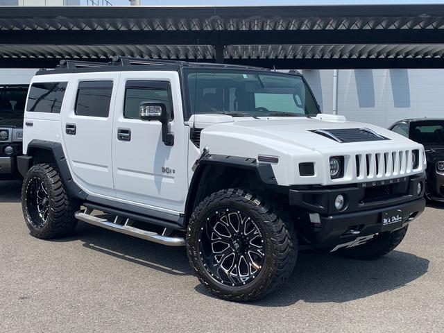 ハマーＨ２ ラグジュアリーパッケージ　新車並行／０８年最終型／社外オーバーフェンダー／ＨＡＲＤＲＯＣＫ２２インチ／ＡＭＰマッドタイヤ／新品ＬＥＤヘッドライト／ワンオフ４本出マフラー／ＬＥＤテール／ナビＴＶ（5枚目）
