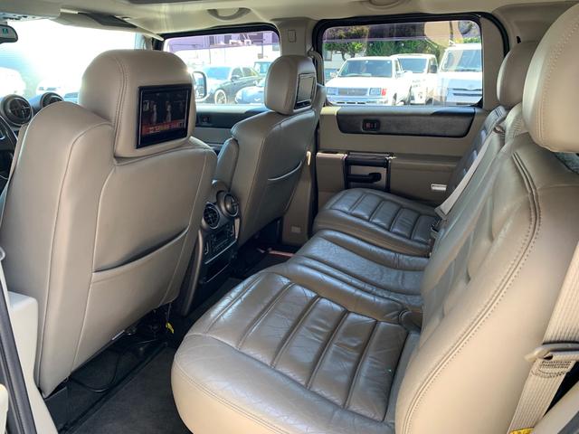 ハマーＨ２ 　新車並行／ＬＥＸＡＮＩ２６インチ／ＣＲＯＳＳ４本出マフラー／本革シート／サンルーフ／実走行／ナビＴＶ／バックカメラ／前後ドラレコ／スモークテール／外装マッチペイント済（18枚目）