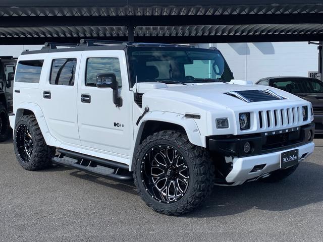 ハマーＨ２ ラグジュアリーパッケージ　新車並行／０８年最終型／社外オーバーフェンダー／新品ＨＡＲＤＲＯＣＫ２２インチ／新品マッドタイヤ／新品ＬＥＤヘッドライト／ワンオフ４本出マフラー／ＬＥＤスモークテール／ナビＴＶ（5枚目）