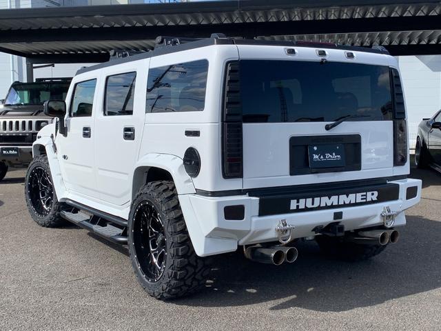 ハマーＨ２ ラグジュアリーパッケージ　新車並行／０８年最終型／社外オーバーフェンダー／新品ＨＡＲＤＲＯＣＫ２２インチ／新品マッドタイヤ／新品ＬＥＤヘッドライト／ワンオフ４本出マフラー／ＬＥＤスモークテール／ナビＴＶ（10枚目）